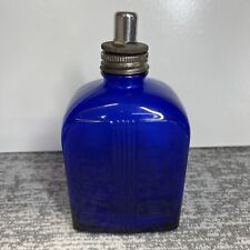 Vintage Cobalt Blue Bottle with Metal Top picture
