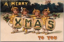 c1910s CHRISTMAS Embossed Postcard Girls w/ Paper Lanterns 