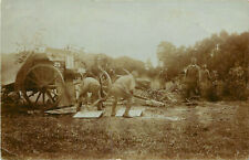RPPC WWI German Soldiers Loading Moving or painting Furniture in the Field  picture