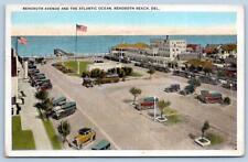 1933 REHOBOTH BEACH REHO AVENUE & ATLANTIC OCEAN OLD CARS AMERICAN FLAG POSTCARD picture
