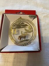 Nevada Solid Brass Nations and Treasures Ornament NV Rider/Coyote picture