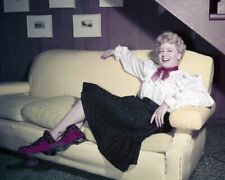 Shelley Winters vintage early 1950's on yellow couch 24x36 Poster picture