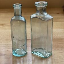 Set Of 2 Aqua Medicine Bottles - 1 x Dr. NC White’s Puly Elixir 1 x Marked T 4 picture