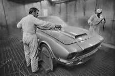 Workers spraying new car at Aston Martin plant Newport Pagnell 1970s OLD PHOTO picture