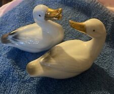 2 White Porcelain ducks with gold beak and black markings on tail 3 1/2” L  3”T picture