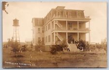 Chamberlain SD~Farnsworth Sanitarium~Patients on Porch~Water Tower~c1910 RPPC picture
