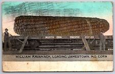 Jamestown North Dakota~William Kavanagh Loads Exaggerated Corn on NP RR Car~1909 picture