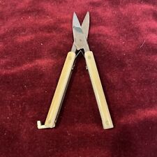 Small antique mother of pearl handled folding scissors picture