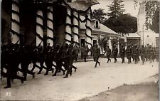 1917 GERMAN SOLDIERS MARCHING INTO A CITY SEPT 6 1917 REAL PHOTO POSTCARD 29-143 picture
