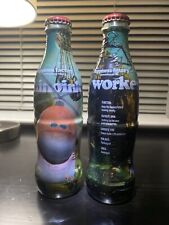2007 World of Coca-Cola 8oz wrapped glass bottles - Chinoink and Worker picture