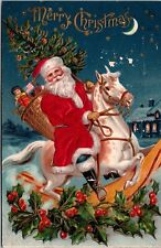 Santa Claus Rides Rocking Horse Real Cloth Red Suit Christmas Postcard JB35 picture