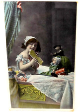 1913 German Color Postcard Girl in Bed with Dolls, Book, Toys picture