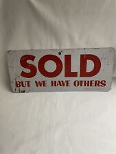 Vintage metal sold sign picture