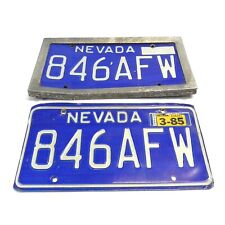 PAIR OF VINTAGE 1980's NEVADA LICENSE PLATES W/ 1985 TAG 1 PLATE WITH FRAME VTG picture