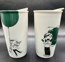 Two (2) Starbucks ceramic travel mugs, Boy w/ Green Balloon & Boy Painter picture