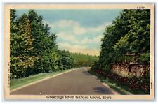 1957 Greetings From Garden Grove Iowa IA, Road View Flowers Vintage Postcard picture