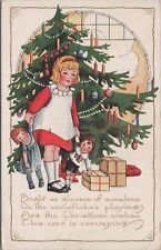 Postcard Christmas Little Girl Playing with Toys 1922 picture