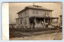 Family Sitting on Front Porch Smoking Portrait Early America RPPC Postcard c1910 picture