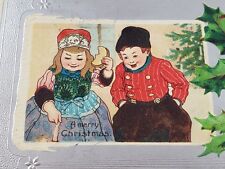C 1907 Boy Girl Merry Christmas Silver Foil Holly Berries Embossed Postcard  picture