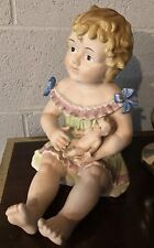Conta Boehme German Bisque Porcelain Piano Baby GIRL holding Doll 12” picture