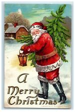 c1910 Merry Christmas Santa Cut Down Tree Lantern Glitter Embossed Postcard picture