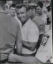 1964 Press Photo Arnold Palmer Escort Police Green picture