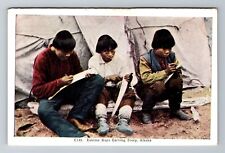 Alaska, AK-Alaska, Eskimo Boys Carving Ivory Antique, Vintage Souvenir Postcard picture