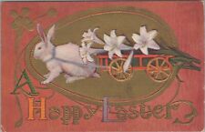 Easter rabbit pulling cart with white lilies flower embossed c1910 postcard A959 picture