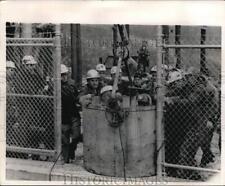 1968 Press Photo Mannington WV rescued miners reach the surface in a bucket picture