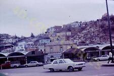 Original slide photo 1971 Nogales Mexico Street Scene Shops Old Cars picture