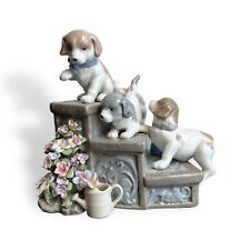 SUBERTO  PORCELAIN THREE PUPPIES ON GARDEN STEPS, DOGS 