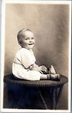 rppc Toddler boy with boy sitting on wicker table 1926-40 Modern Studio Toronto picture