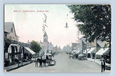 1908. SEYMOUR, WIS. MAIN ST. LOOKING SOUTH. POSTCARD EE18 picture