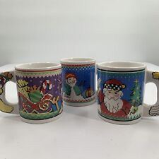 Set Of 3 Pixel Patchwork Knit Style Sleigh, Snowman And Santa Mugs picture