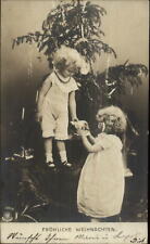 German Christmas - Kids & Tree c1905 Real Photo Postcard picture