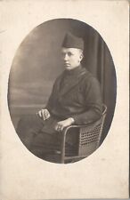 RPPC Handsome WW1 Soldier Seated for Photo Postcard Z2 picture
