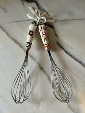 A Pair of Temptation Old World Whimsical Red & Green Ceramic Handled Whisks picture