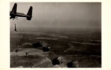 Postcard paratroopers, jumping out of Fairchild XC – 120 Airplane RPPC picture