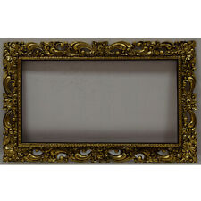 Old wooden openwork frame with metal leaf Internal: 23,8x12,7 in picture