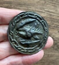 MEDIEVAL. 15TH CENTURY. BRASS ROUNDEL. REPOUSSE DECORATION OF A CROWNED EAGLE. picture
