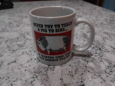 Humorous Never Try To Teach A Pig To Sing Coffee Mug picture