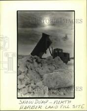 1982 Press Photo Truck dumps snow on the landfill area south of Summerfest picture