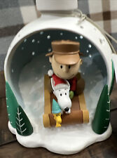 Hallmark 2023 PEANUTS FIGURINE WITH LIGHT Charlie Brown $ Snoopy Sledding 4.6” picture