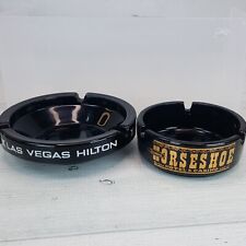 Vintage Set of 2 Las Vegas Nevada Black Glass Ashtrays Hilton & Horseshoe Casino picture
