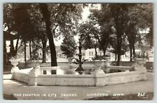 Hampton Iowa~City Square Fountain~Flower Urns~Storefronts Behind~1941 RPPC picture