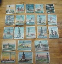 large lot of Hassan Tabacco cards, lighthouse, ships, alaska picture