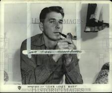 1949 Press Photo Ronald Reagan poses with cigarette in comedy 