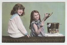 [15540] OLD POSTCARD TWO YOUNG GIRLS GETTING READY TO HAVE PUNCH at HOME picture
