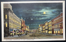 Postcard Jackson MI - Main Street Business District at Night Moonlight picture