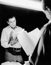 Glenn Ford reads through the script on the set of the MGM weste - 1958 Old Photo picture